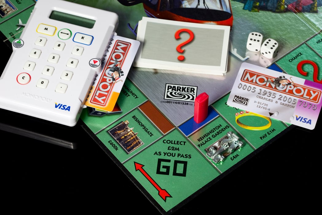 Modern version of Monopoly board game with electronic banking